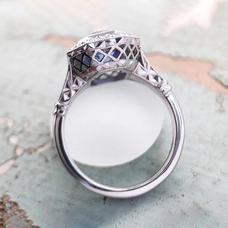 Fashion long hexagonal blue metal women's ring made of copper with electroplated finish, front view