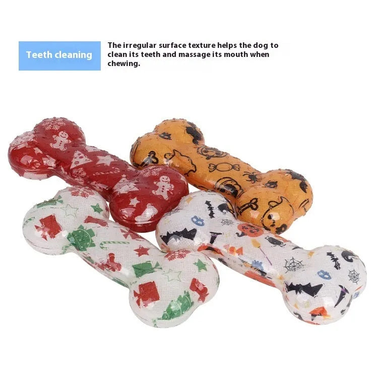 TPR bone-shaped chew toy with printed details in seasonal colours, produces nibbling sound when chewed