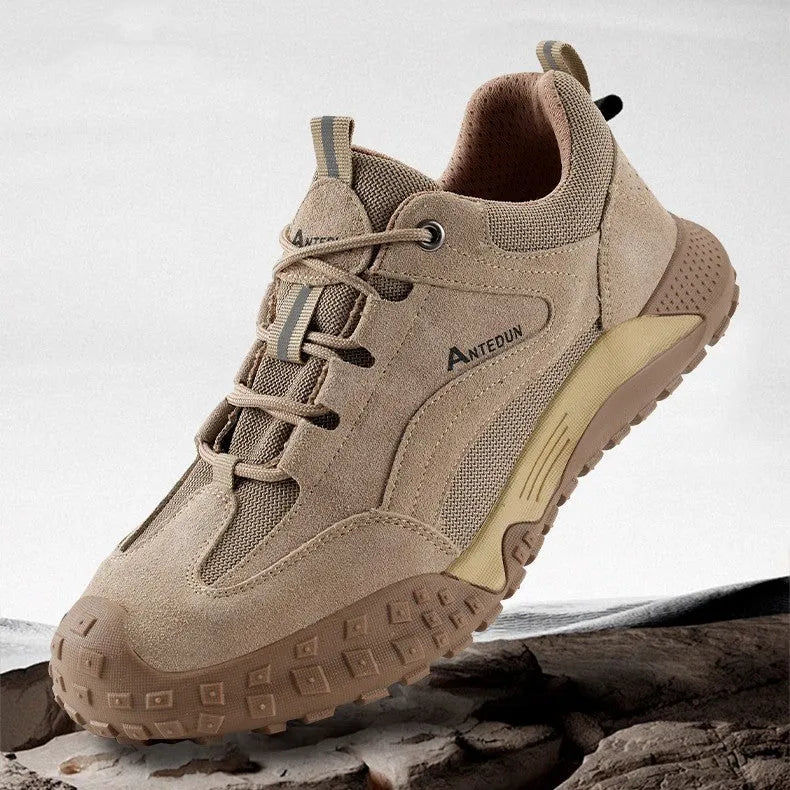 Men's khaki suede and canvas low-top safety shoes with lace-up closure and plastic steel toe for construction site use