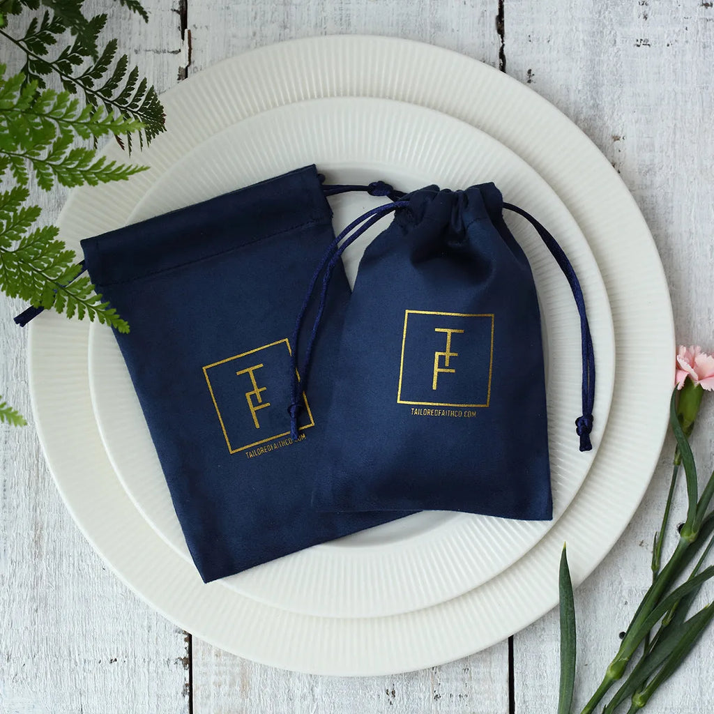 Flannel drawstring storage pouch in coffee colour, 9x12cm size, with drawstring closure on white background.