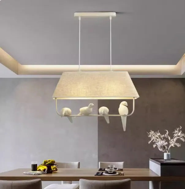 Iron and fabric bird chandelier ceiling lamp with decorative bird silhouette shade.