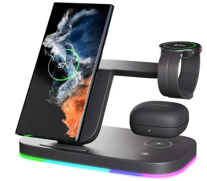 A vertical 3-in-1 wireless charging stand holding a mobile phone, a smartwatch, and headphones on a desk.