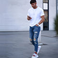 Men's deep blue hole distressed jeans in cotton fabric showing six available sizes