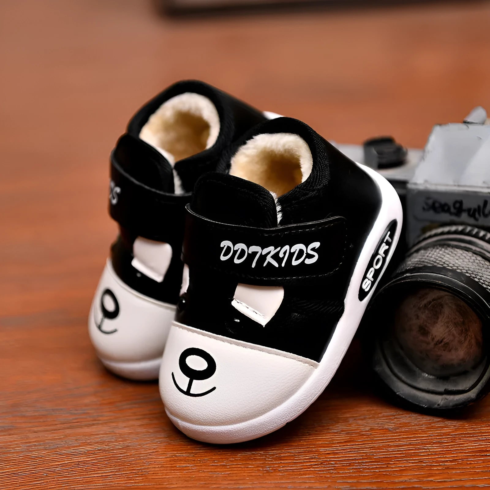 Baby toddler shoes in black with Velcro closure, plain casual style for girls and boys