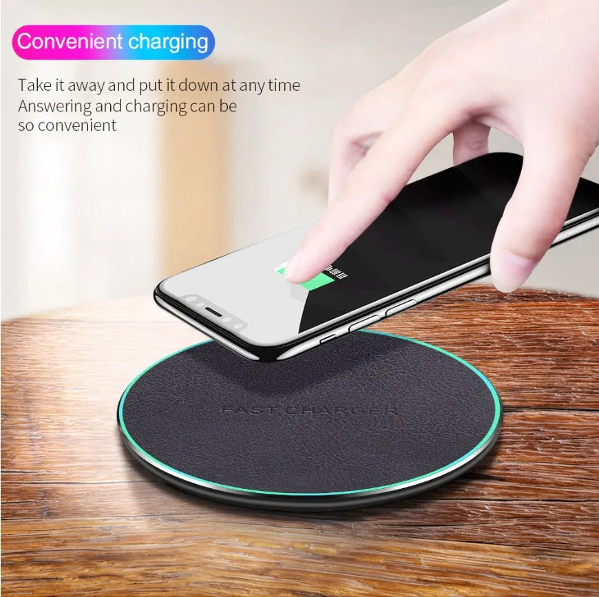 Black circular Qi wireless charger for iPhone 11 with non-slip base