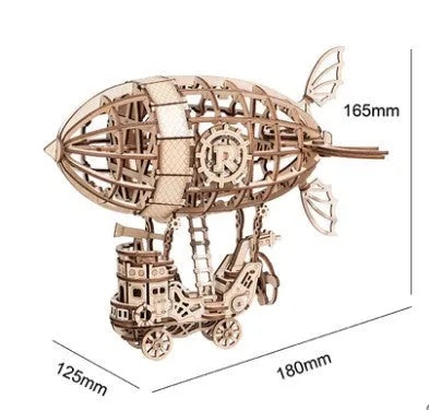Wooden 3D puzzle model of a radio assembled from pre-cut wood pieces on a white background