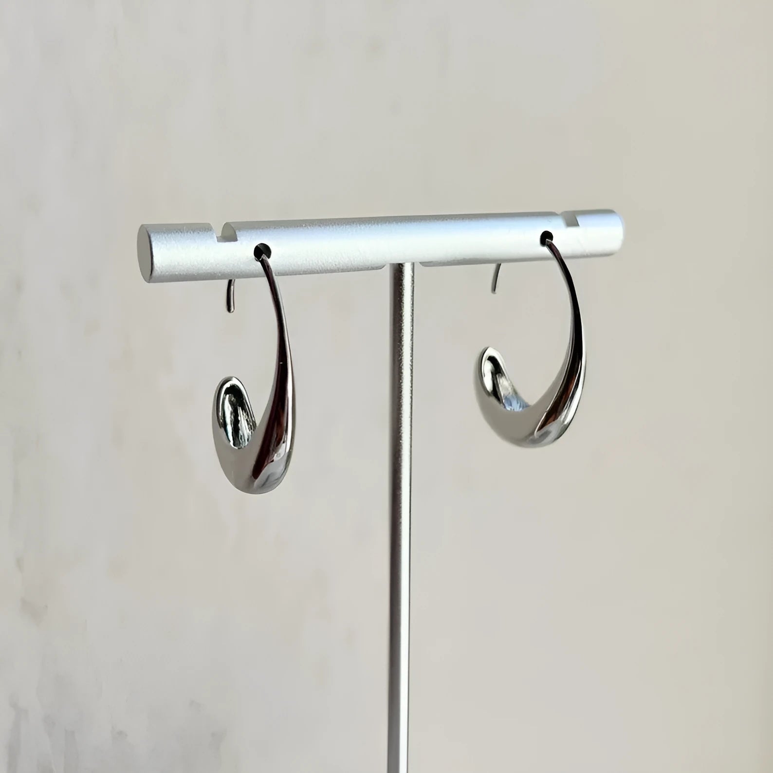 Gold and silver alloy earrings with snake design and electroplated finish