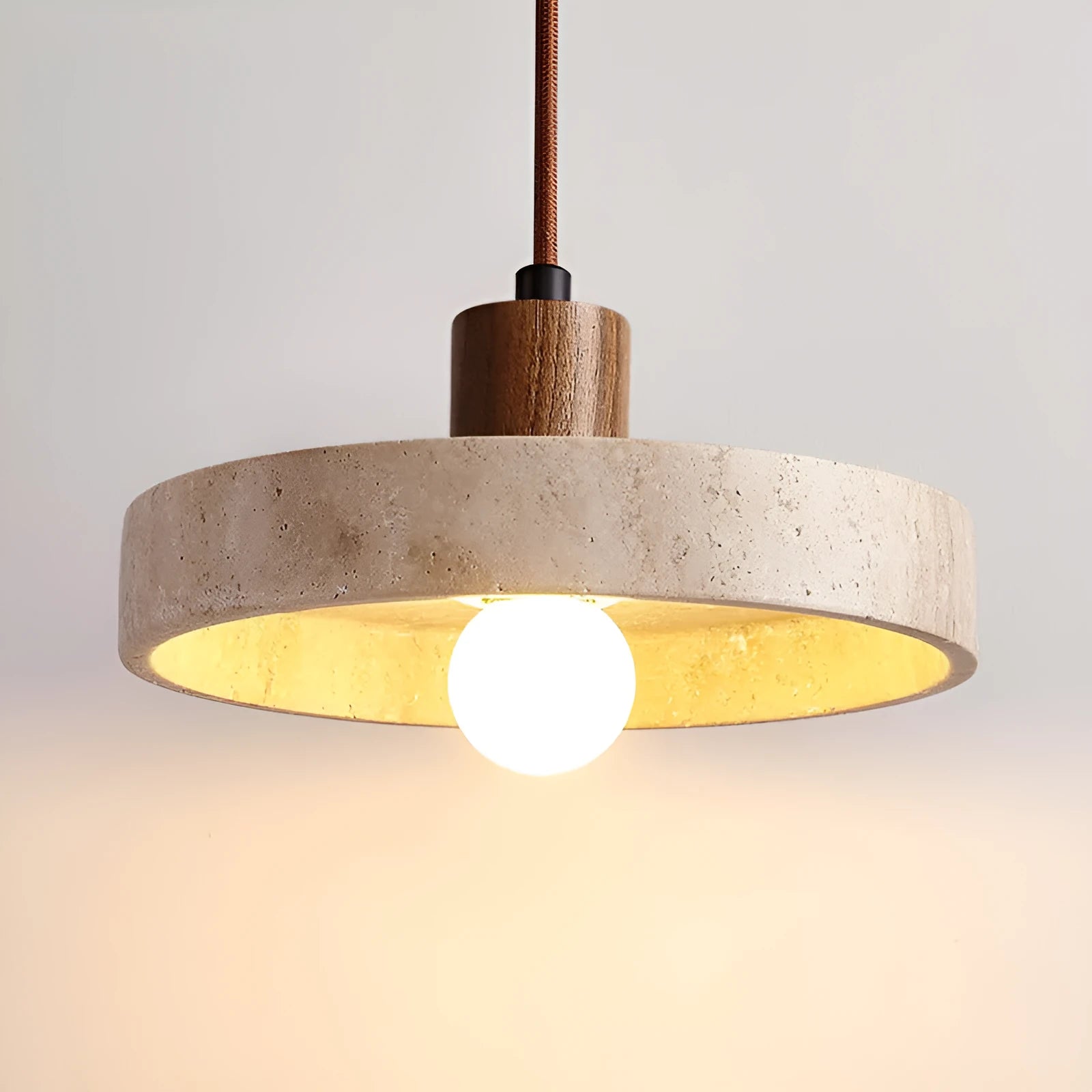 Small yellow cave stone and solid wood pendant light on a bedside table, 21 cm diameter, wood colour option