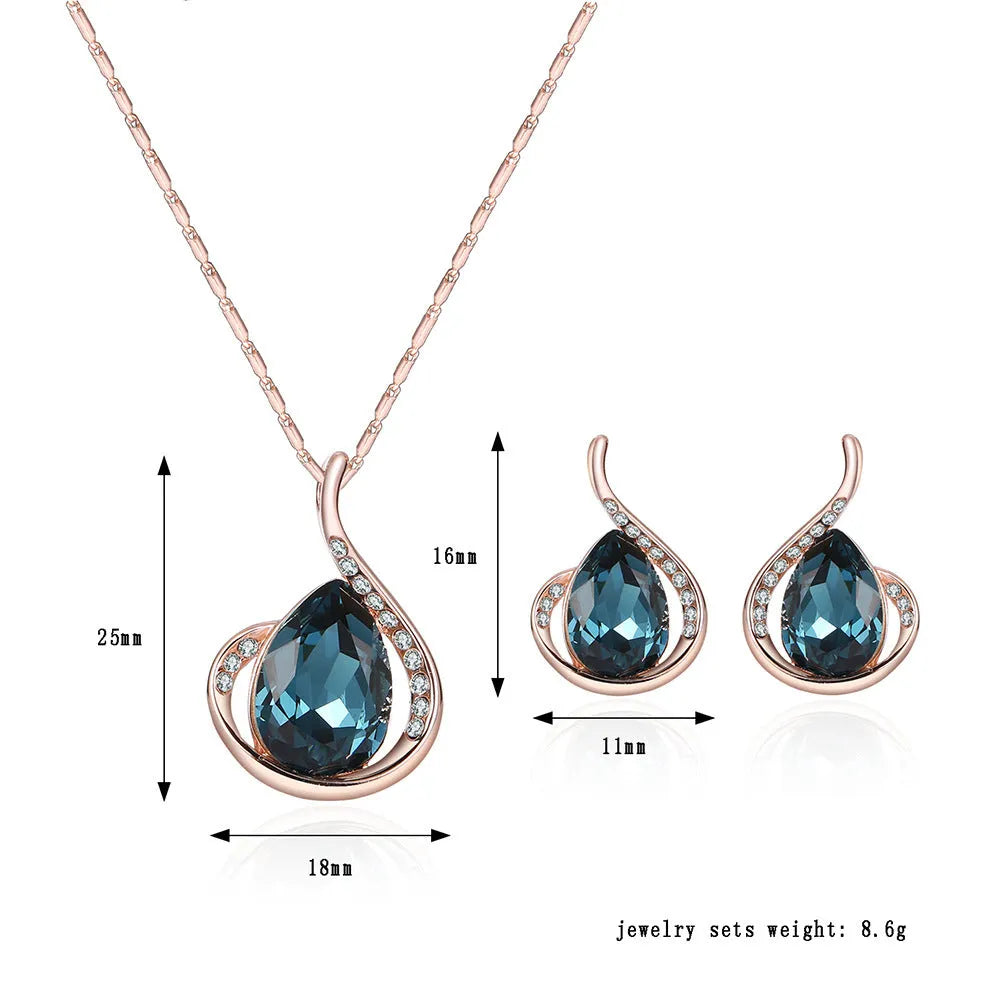 Rose gold alloy necklace and earrings bridal set with diamond crystal pendant and artificial gem inlay