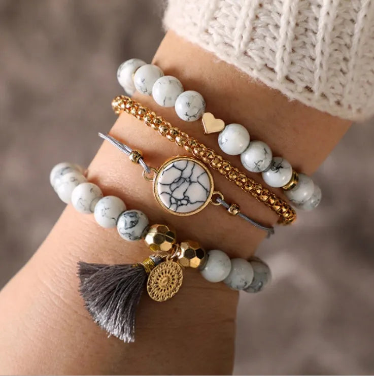 Geometric creative hollow fringed pine stone bracelet four-piece set in white alloy with electroplated finish
