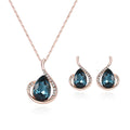 Rose gold alloy necklace and earrings bridal set with diamond crystal pendant and artificial gem inlay