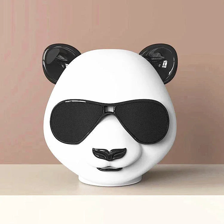 Compact classic style portable mini Bluetooth speaker on a surface.