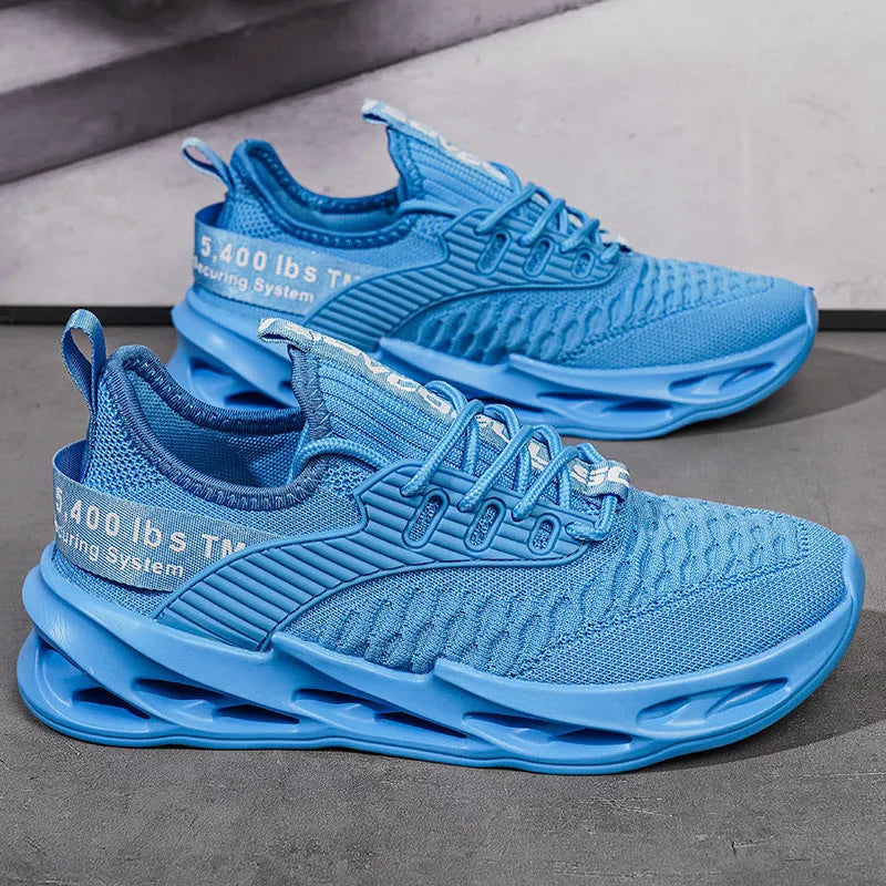 Women's FlyKnit mesh casual trainers in black, showing round toe and flat heel design.
