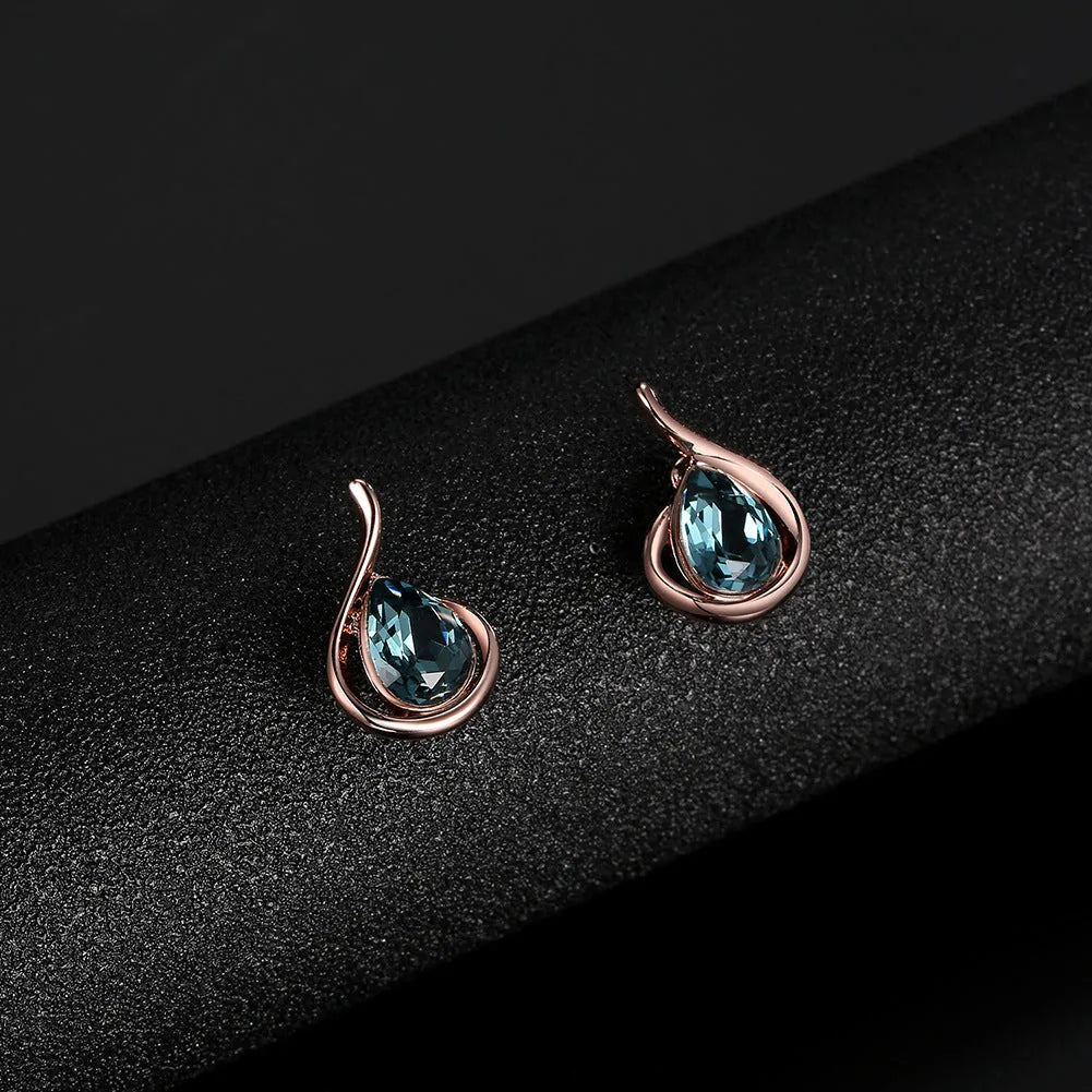 Rose gold alloy necklace and earrings bridal set with diamond crystal pendant and artificial gem inlay