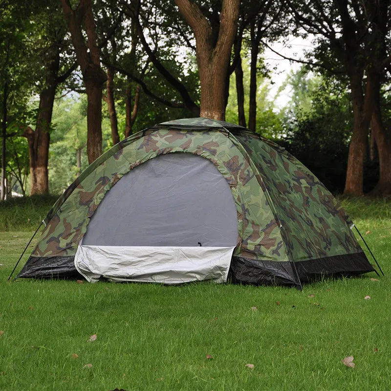 Green camouflage two-person camping tent with fibreglass poles and mesh windows