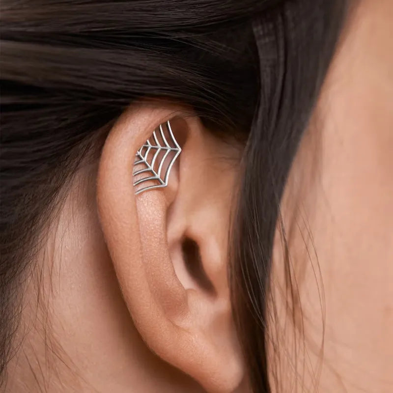 Spider web geometric mesh stud earrings in gold or silver electroplated metal for horror Halloween jewellery