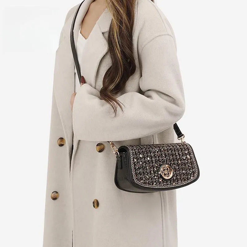 Black polyester crossbody shoulder bag with chain strap for commuter leisure travel