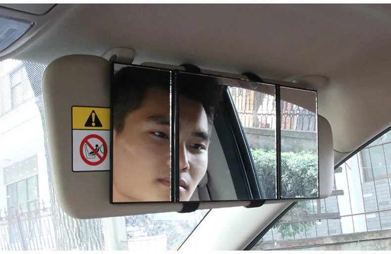 Silver folding car visor mirror shown closed and opened on a car sun visor.