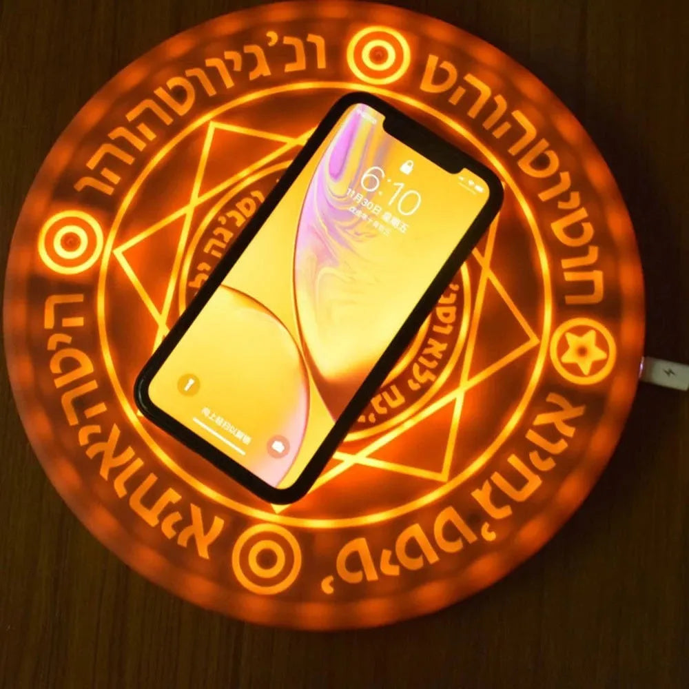 Square black 10W fast wireless charging pad with glowing magic array pattern for Qi phones.