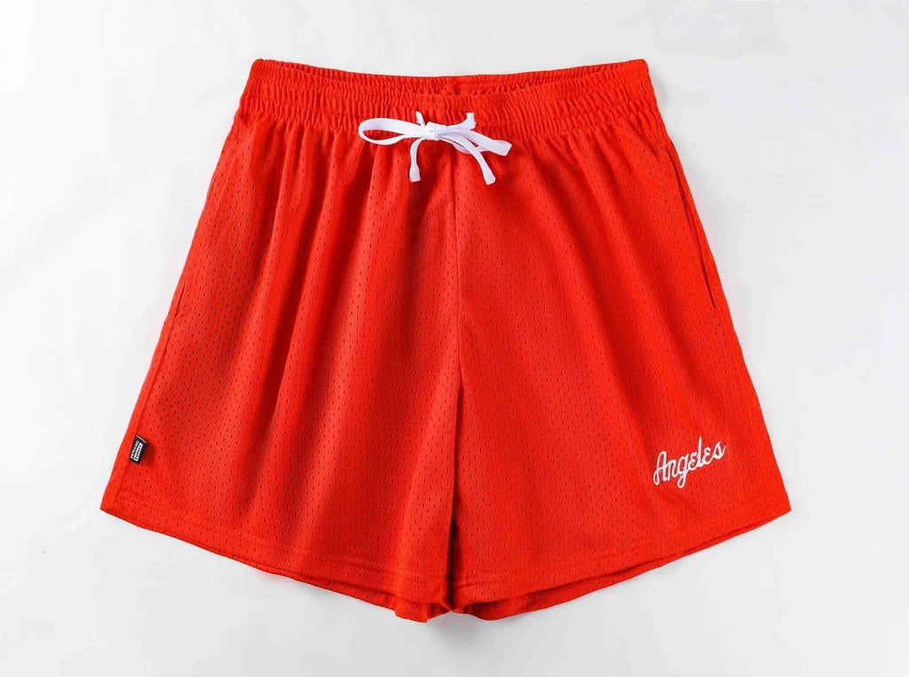 Men's black double-layer mesh shorts laid flat, showing sporty design and mesh fabric texture.