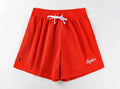 Men's black double-layer mesh shorts laid flat, showing sporty design and mesh fabric texture.