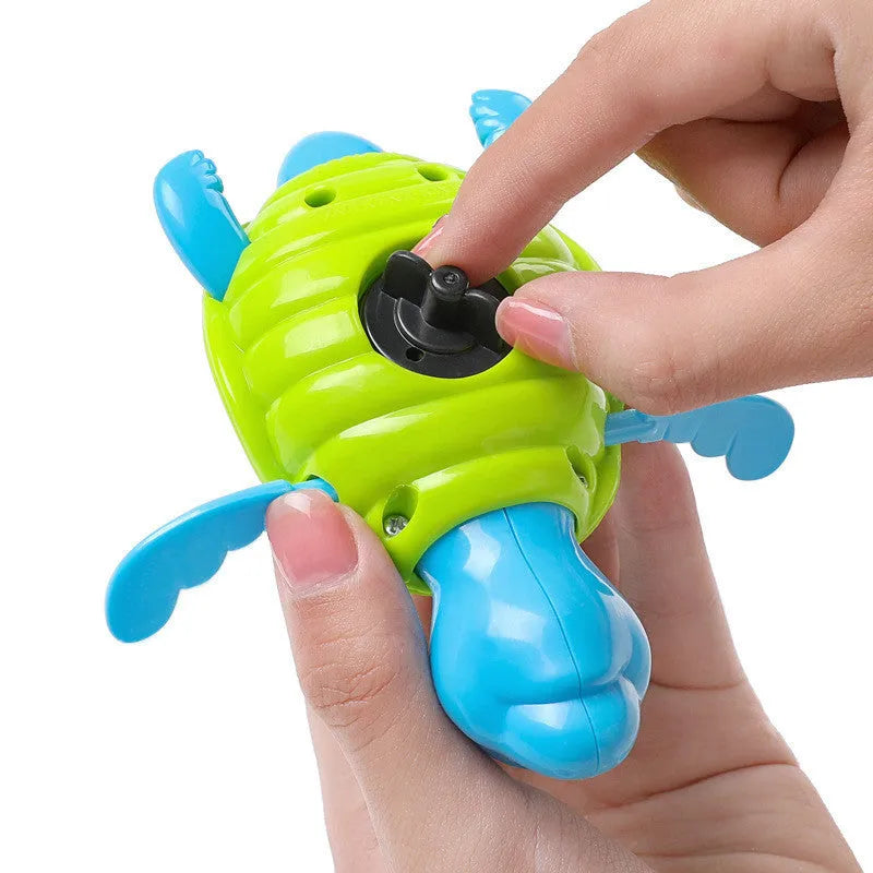 Plastic swimming turtle baby bath toy for water play with random colour selection