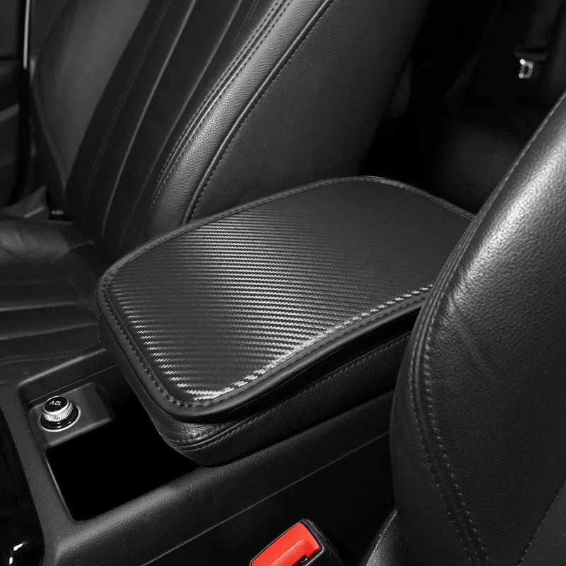 Leather carbon fibre pattern armrest mat for car centre console measuring 29 by 19 centimetres