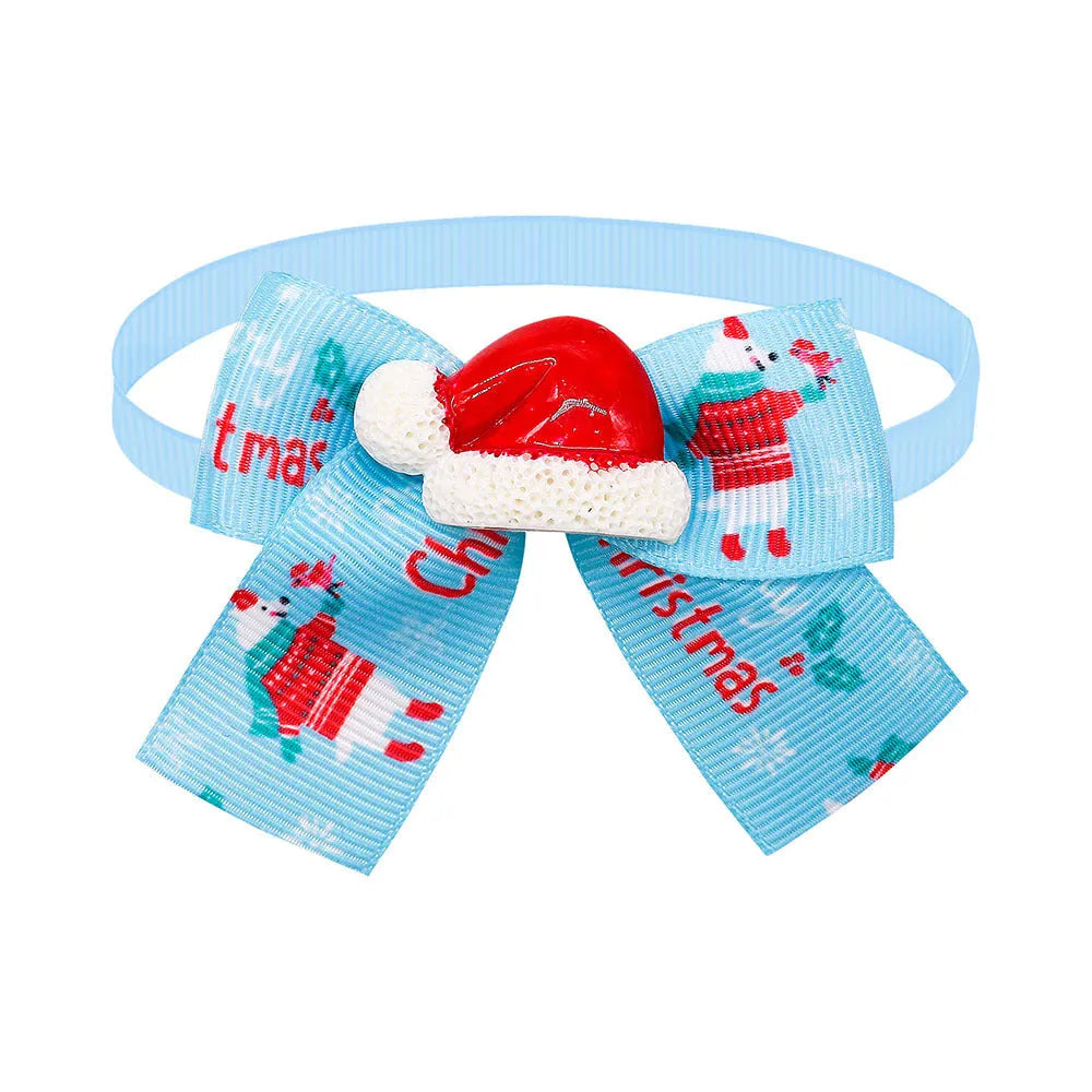 British-style polyester Christmas pet bow tie accessory in red and green on white background