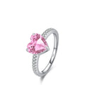 Women's sterling silver love ring with heart zircon mosaic in white color, side view on white background