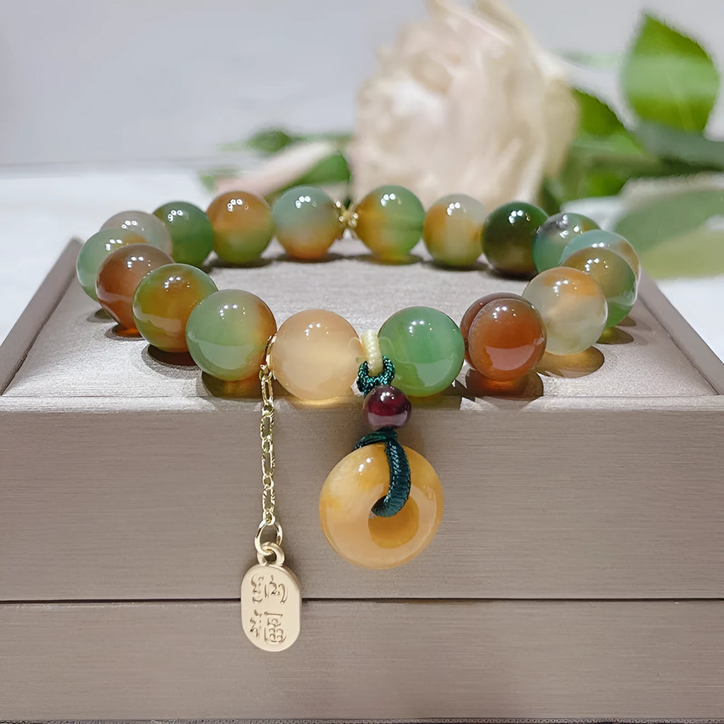 Peacock agate coloured women's bracelet with a peace buckle, made from agate and alloy.