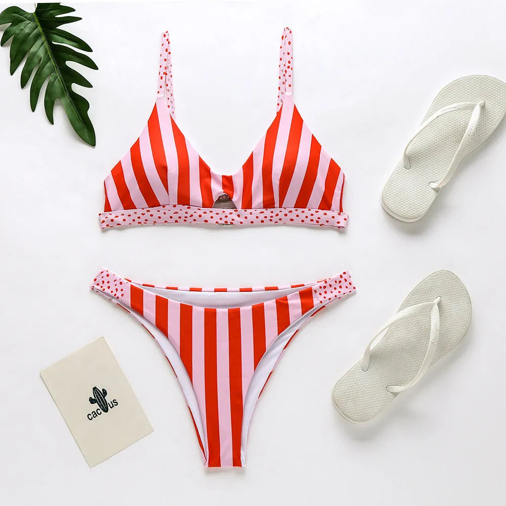 Women's two-piece polyester bikini in black and white dots or red and white stripes.