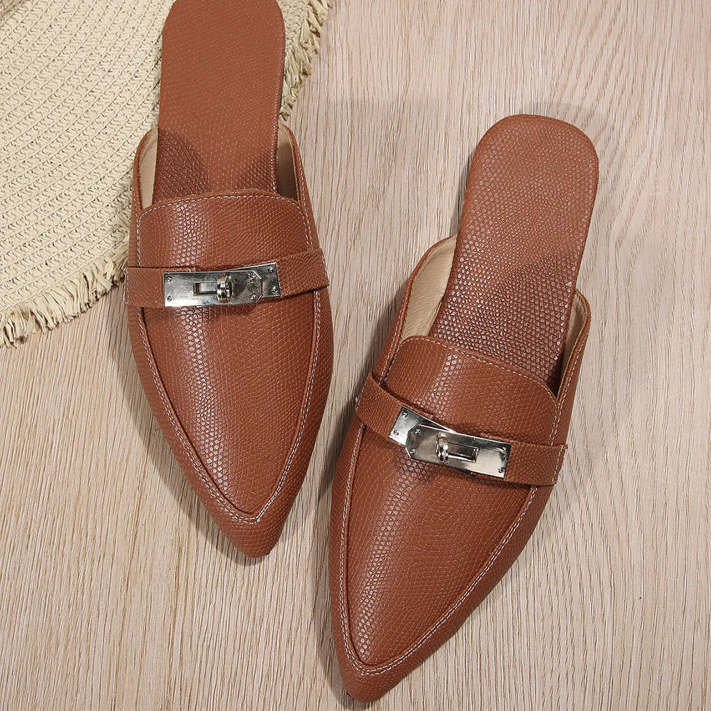 Light brown women's pointed-toe semi-slippers with a low heel and rubber sole on a white background.