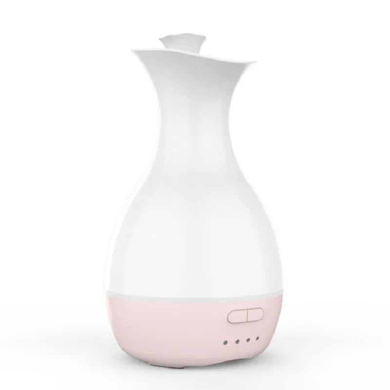 White ultrasonic humidifier with colourful night light functioning as aromatherapy diffuser and flower vase