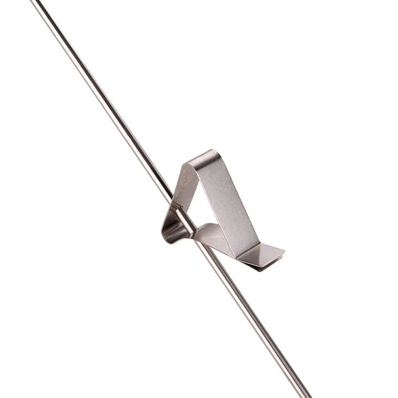Digital food thermometer with stainless steel probe and display showing temperature reading