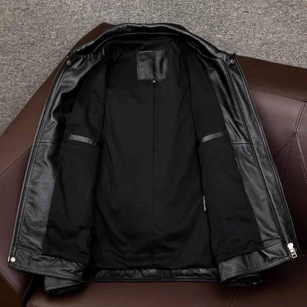 Men's plus size black retro lapel leather jacket with loose fit on hanger.