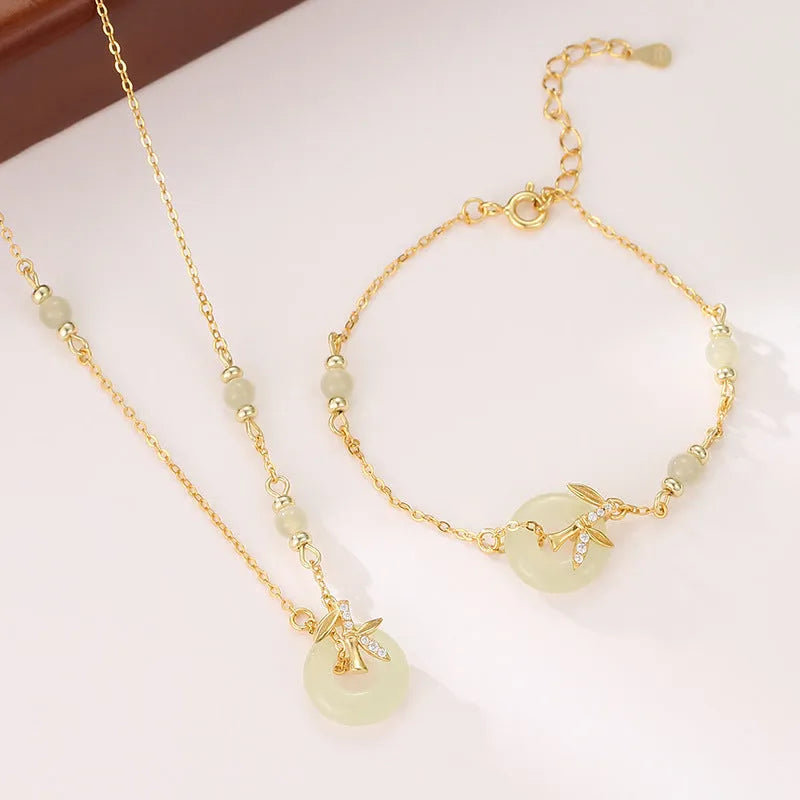 Antique style women's 925 silver bracelet with a peace buckle and safety clasp on a jewellery tray.