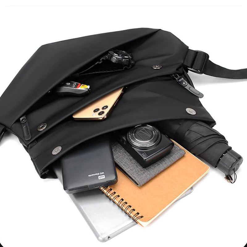 Grey PU leather crossbody bag for men showing front zipper and adjustable shoulder strap