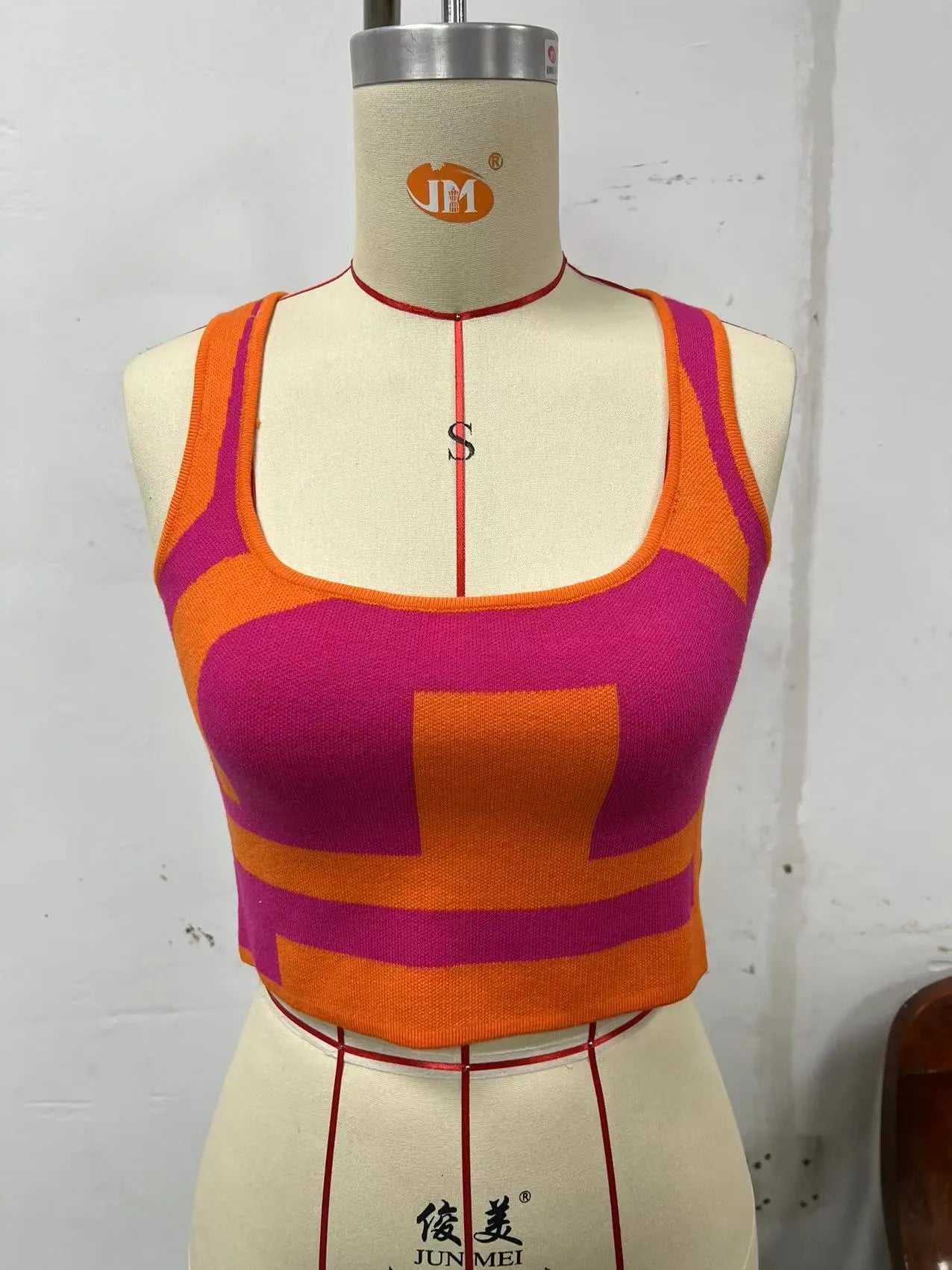 Women's U-collar camisole vest in slim-fit polyester fabric shown in multiple colours