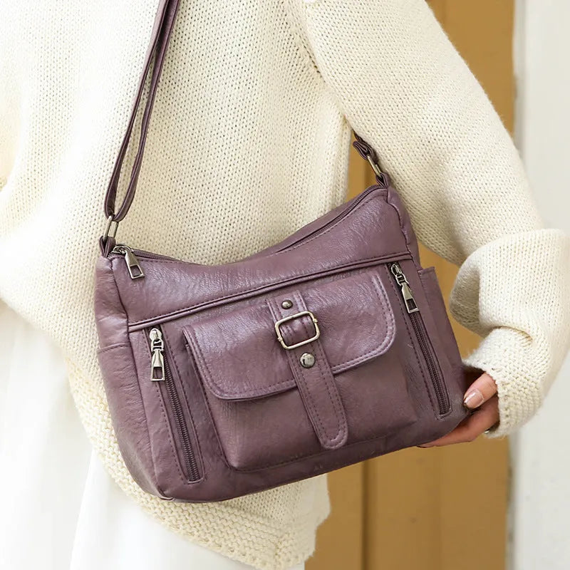 Retro soft PU leather shoulder messenger bag, 27x20x10cm, in black, brown, blue or purple, with sandwich pocket.