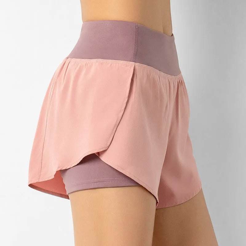 2-in-1 active shorts in Light Blue, polyester fibre, size M, flat lay view showing outer short and built-in liner
