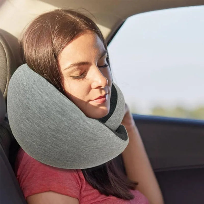 U-shaped travel neck pillow with memory foam filling in navy blue colour with buckle fastening