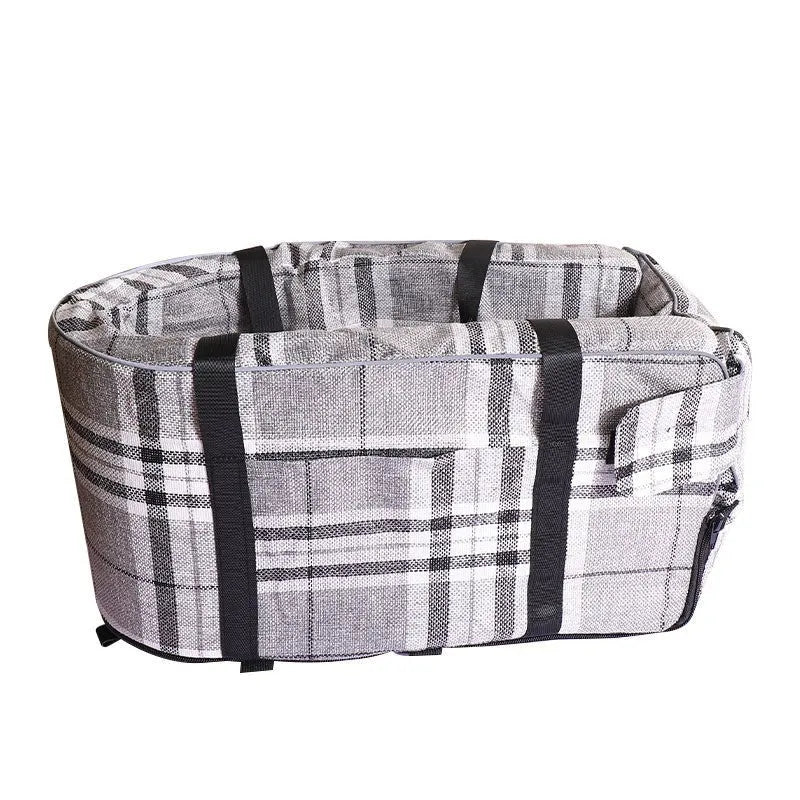 Outdoor cloth dog kennel in a choice of grey, blue, red, or grey mesh colour, shown in a garden setting.