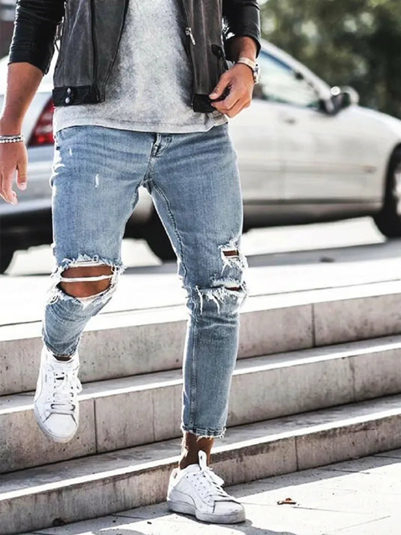 Men's light blue straight-leg distressed jeans with embroidery and washed finish, five-point length, mid-rise zip closure