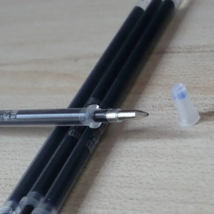 Automatic fade away pen set with holder, case and eight refills for temporary writing