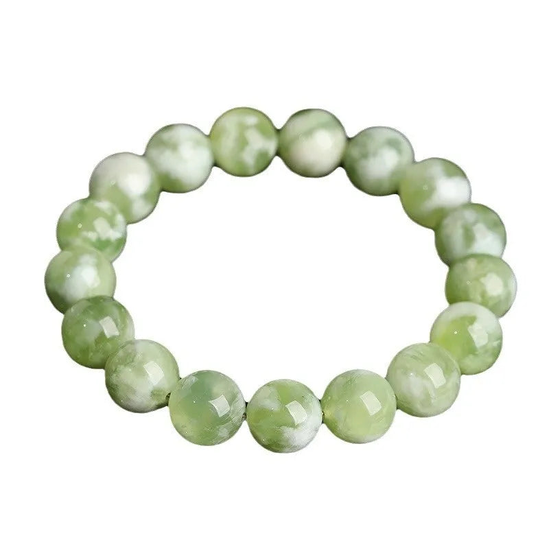 Green milk-in-water Xiuyan jade bracelet with geometric beads and polished finish