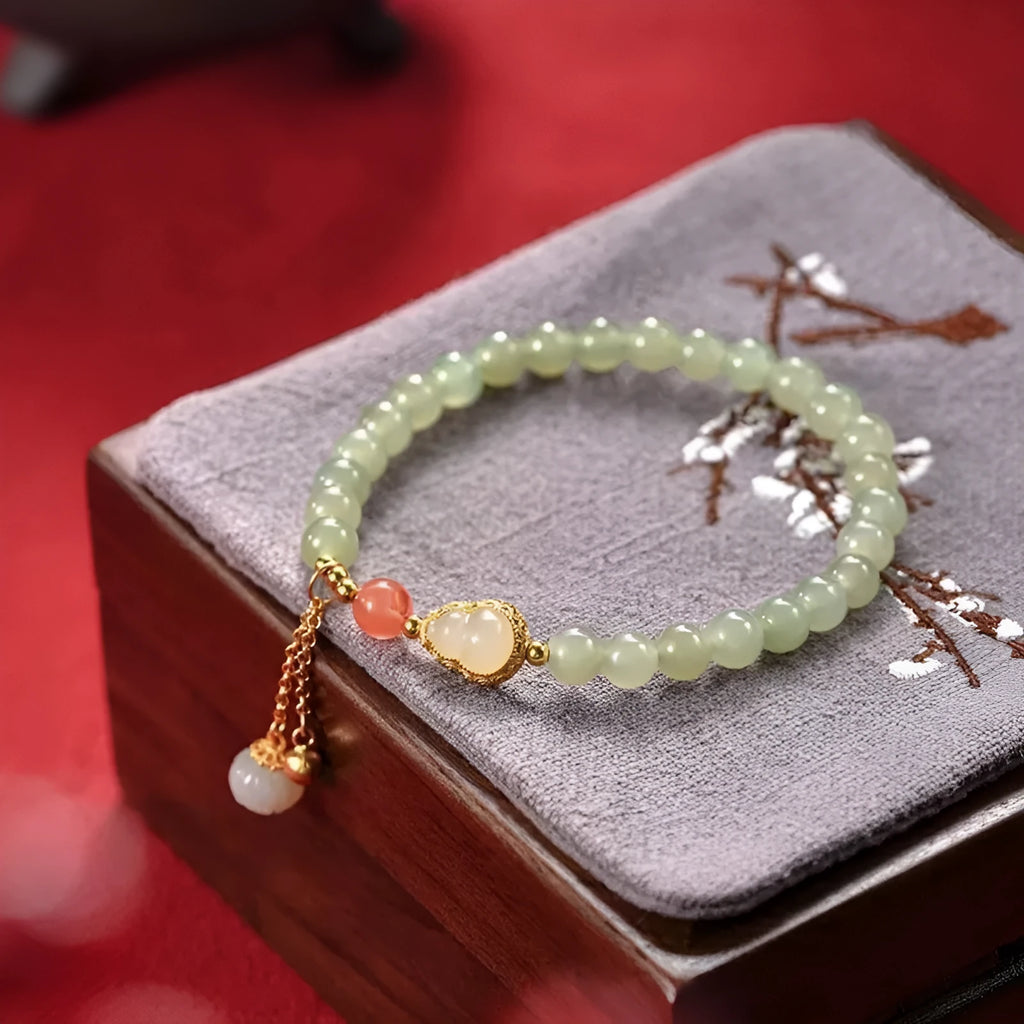 Qingshui jade women's bracelet with gold plated 6mm beads and Chinese fu character