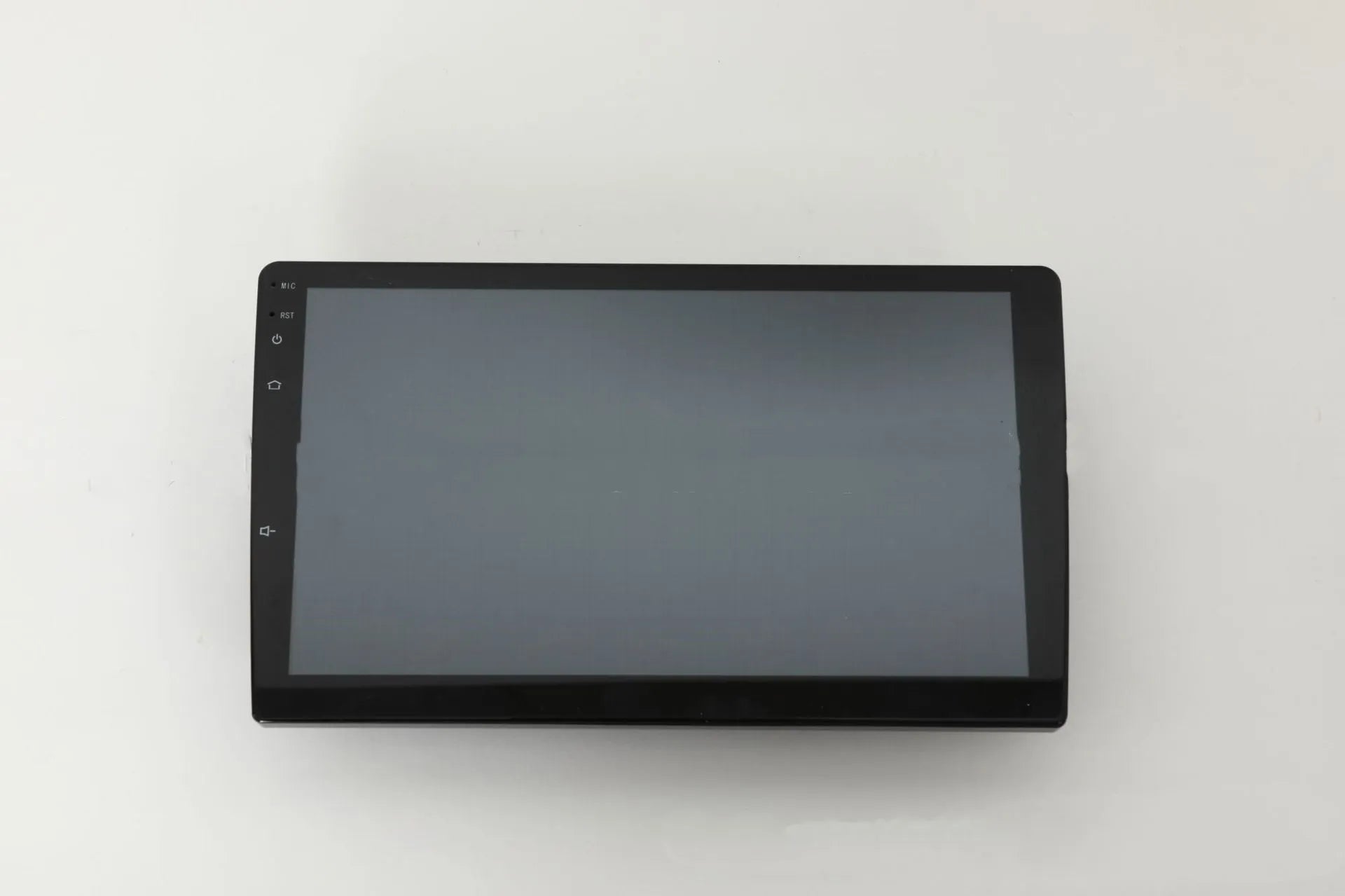 Black 10.1 inch Android car head unit with touch screen display showing navigation interface