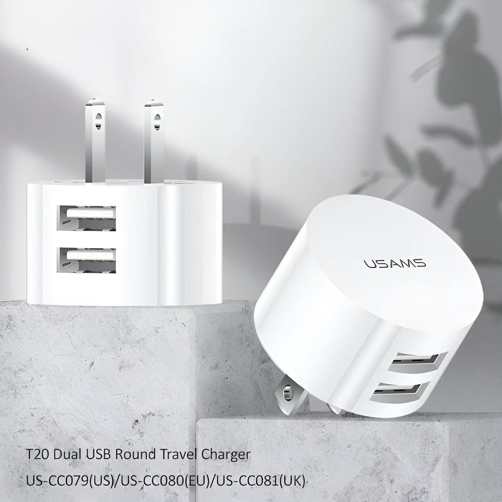 White dual USB phone charger with international plugs for US EU UK regions showing compact 39mm diameter design