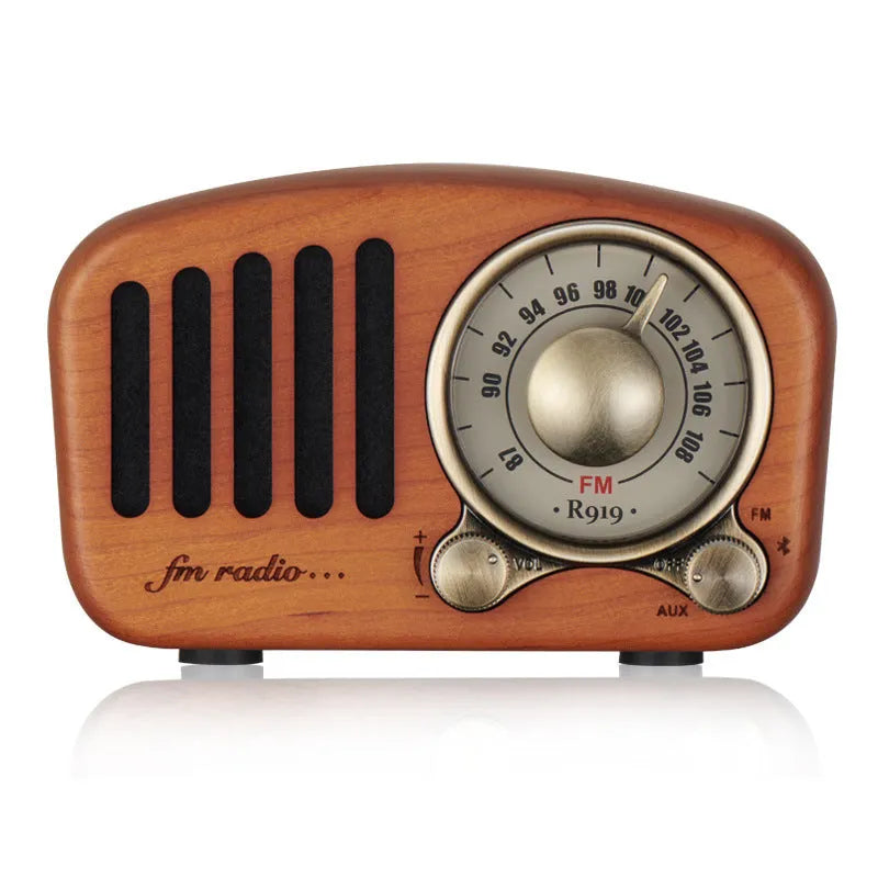 Retro wooden mini Bluetooth speaker in cherry or walnut finish showing compact size
