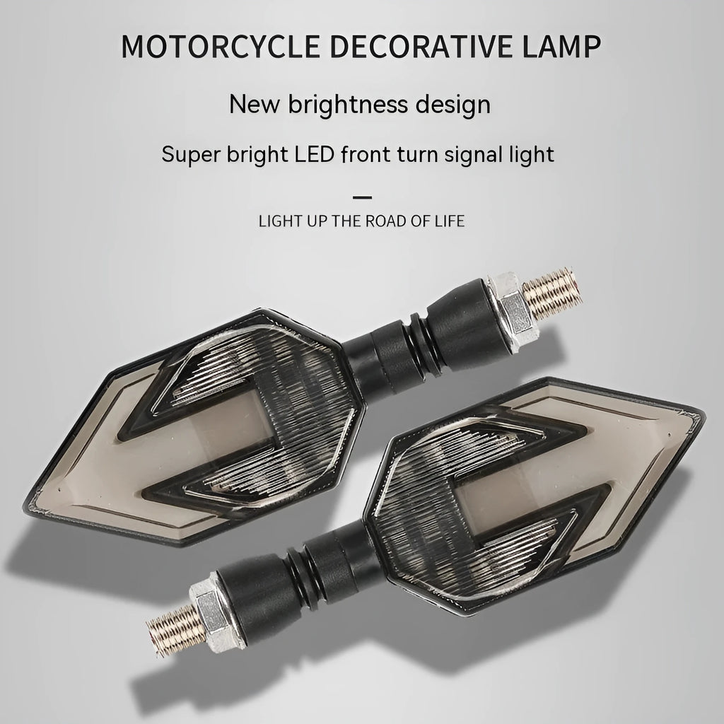 Arrow-shaped LED motorcycle indicator lights showing yellow with blue, red, or white lighting options